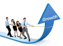 Business Team pulling growth arrow